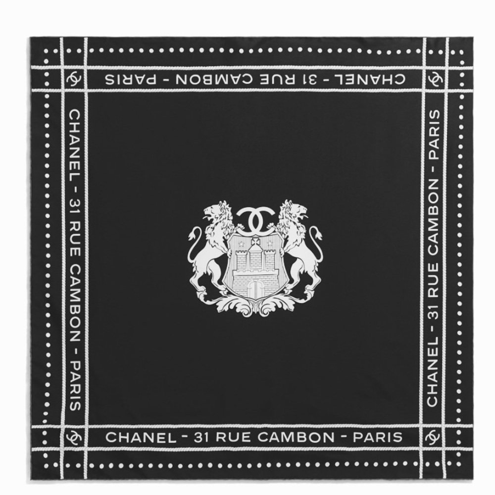 Chanel Black Square Scarf with pink trim.